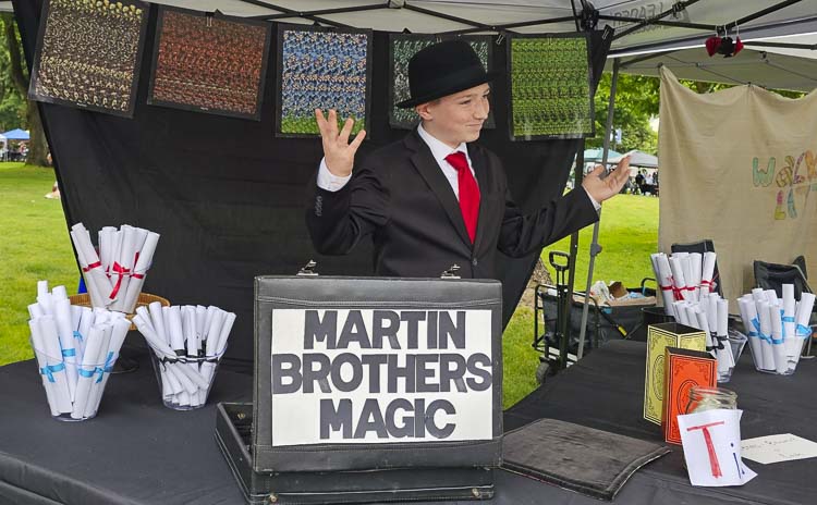 Blaise Martin of Battle Ground performed magic Saturday at the Greater Vancouver’s Junior Market. Photo by Paul Valencia