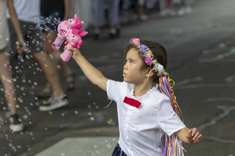 Maria Wang and her bubble machine added to the festive atmosphere at Camas Days on Saturday. Photo by Mike Schultz