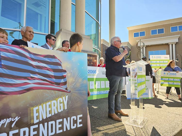 Greg Lane of the BIAW addresses the crowd of I-2066 supporters in front of the Secretary of State office in Tumwater. The initiative gathered the largest number of signatures in 50 years, he told people. Photo by John Ley