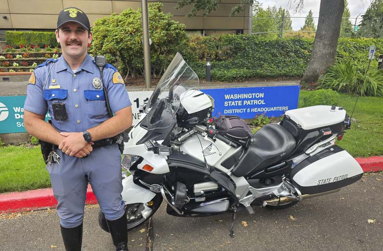 Bennie Taylor Jr. is passionate about motorcycles and the motorcycle community. A trooper for the Washington State Patrol, Taylor is giving safety tips for riders as well as drivers of cars, trucks and SUVs to be aware of motorcyclists. Photo by Paul Valencia
