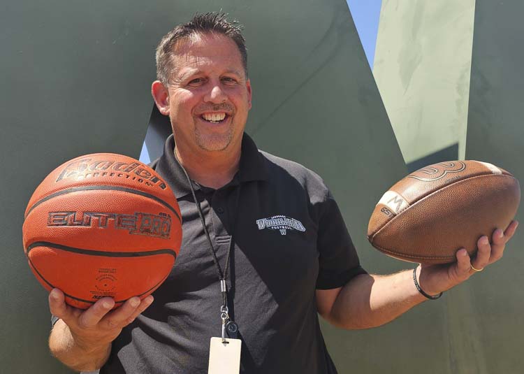 Glen Flanagan, the longtime head coach of the Woodland girls basketball team, is now also the head coach for the Woodland football team. Photo by Paul Valencia