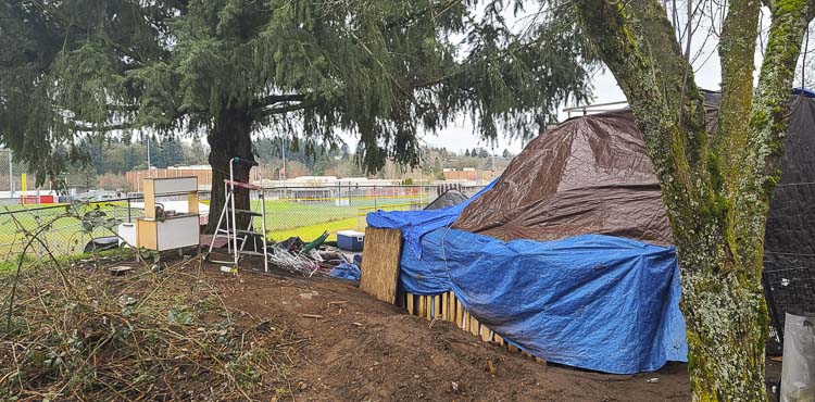 In 2022, a homeless camp was set up just beyond the fence from Fort Vancouver High School. Thefts. Vandalism. Litter, including drug paraphernalia and human waste. All reported to the city but it would take months before the campers were removed and the site was cleaned. Photo by Paul Valencia