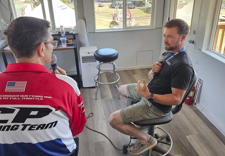 Brett Stralo, a combat veteran and a member of Veteran Motocross Foundation, is interviewed by Washougal MX Park track announcer Curtis Paulson on Thursday. Stralo is in town for Military Appreciation during the Washougal MX National. Photo by Paul Valencia