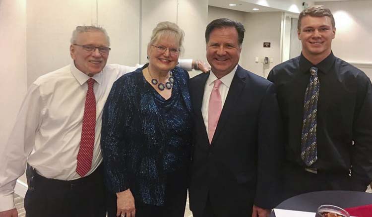 Chuck and Anna Miller, their grandson Noah pose with conservative radio talk show host Lars Larson who emceed the CCRP Lincoln Day dinner in June 2017. Photo from social media page