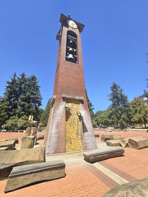 The Salmon Run Tower will be restored this summer, including its bronze art work. The city has also turned off the water to the nearby water feature, a popular attraction during the hot summer days. Photo by Paul Valencia