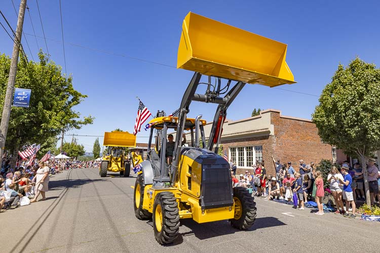 Pape Machinery salutes America at the Fourth of July parade in Ridgefield. Photo by Mike Schultz