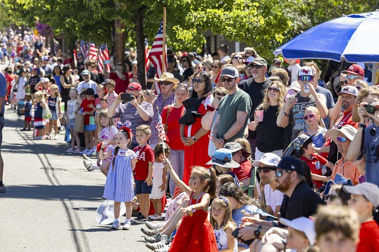 Every year, the crowds show up for the Fourth of July parade in Ridgefield. Organizers say 5,000 people visit the festival each year. Photo by Mike Schultz