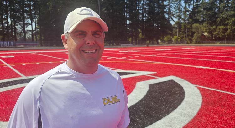 Adam Mathieson is all smiles as the new head coach of the Camas Papermakers. Photo by Paul Valencia