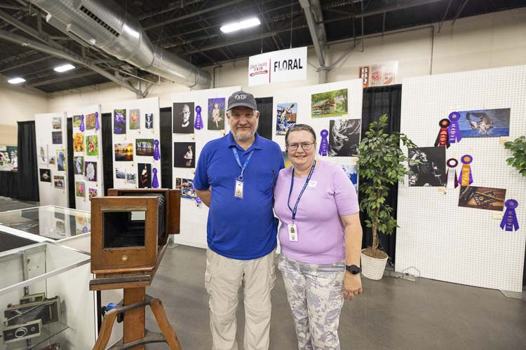 Jeff and Colleen Relyea add to their large personal collection of antique and unique cameras every year, and they put them on display at the Clark County Fair. Photo by Mike Schultz