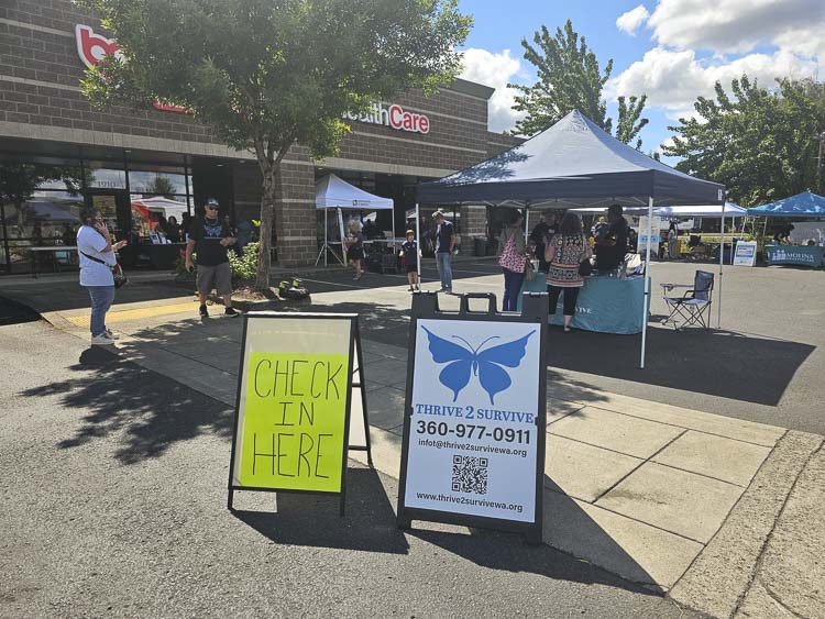 More than 200 people in need signed up at Friday’s Thrive 2 Survive pop-up event in Battle Ground. Photo by Paul Valencia