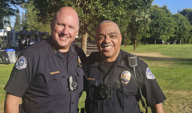 Vancouver’s chief of police, Jeff Mori, left, and the deputy chief, Troy Price, attended a National Night Out event on Wednesday. Mori, who is retiring in October, made it clear he hopes the city will hire Price as its next police chief. Photo by Paul Valencia