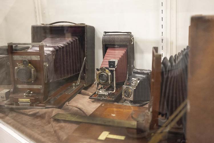 In all, Jeff and Colleen Relyea display about 100 items every year from their personal collection of antique cameras, about a quarter of the total number of cameras they own. Photo by Mike Schultz