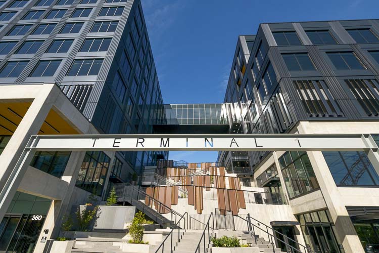 The two-building complex features 366,000 square feet of Class A office space, 12,000 square feet of ground floor retail space, and premium commercial amenities in the city’s burgeoning waterfront district. Photo courtesy Port of Vancouver USA