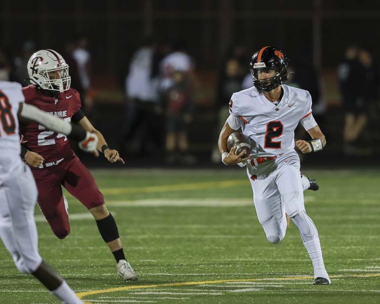 Battle Ground quarterback Ethan Adams had the offense rolling Friday night, but the Tigers just missed against Prairie, falling 43-38. Photo courtesy Chris Barker