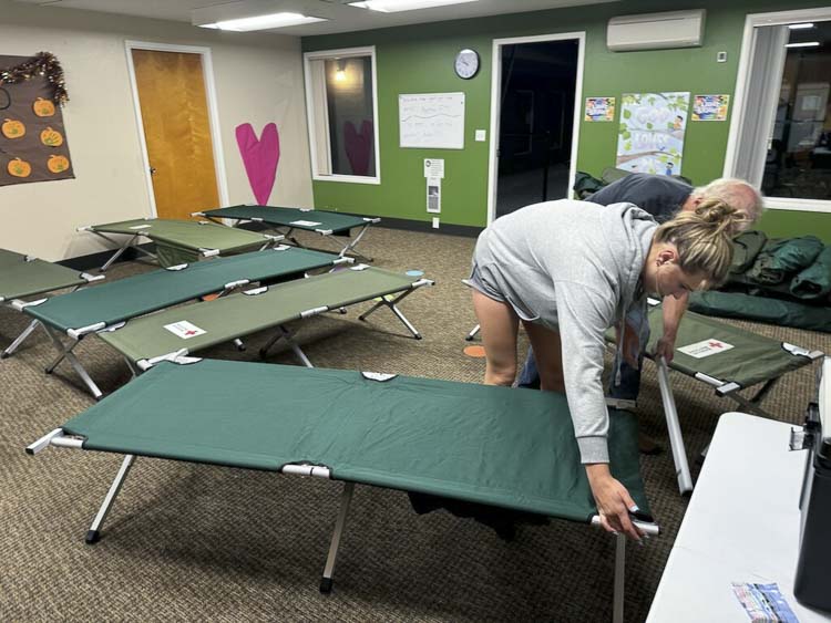 Leaders from Ridgefield Church of the Nazarene set up cots Monday in anticipation of welcoming residents who were displaced by an apartment fire in Vancouver. Photo courtesy Ridgefield Church of the Nazarene