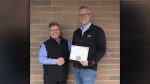 Shown here (left to right) are AWSP Deputy Director Jack Arend and River HomeLink Principal Matt Kesler. Photo courtesy Battle Ground School District