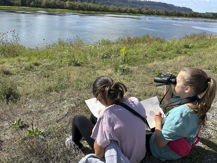 Students look through binoculars and identify different bird species. Photo courtesy Washougal School District