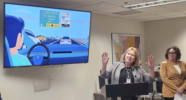 Vancouver Mayor Anne McEnerny-Ogle and C-TRAN CEO Leann Caver were among the officials at the Washington State Department of Transportation Region Headquarters Thursday to celebrate the activation of the metro area’s first part-time shoulder lane on State Route 14. Photo by Paul Valencia