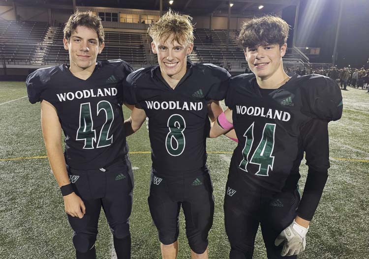 Woodland long snapper Evan Martynowicz (42), kicker Josiah Graham (8), and holder Alec Martynowicz (14) have put in the work to make the special teams that much more special with the Beavers this season. Photo by Paul Valencia