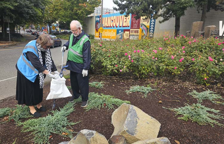 Ted and Sue Robinson of Vancouver volunteered to Pick It Up, Vancouver on Friday to help clean up their neighborhood. Photo by Paul Valencia