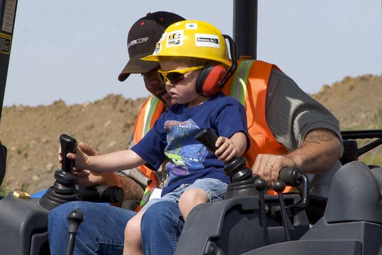 Children can operate heavy machinery, with adult supervision, at Dozer Day. This year’s event is Oct. 5 and 6 at the Clark County Event Center at the Fairgrounds. Photo courtesy Dozer Day.