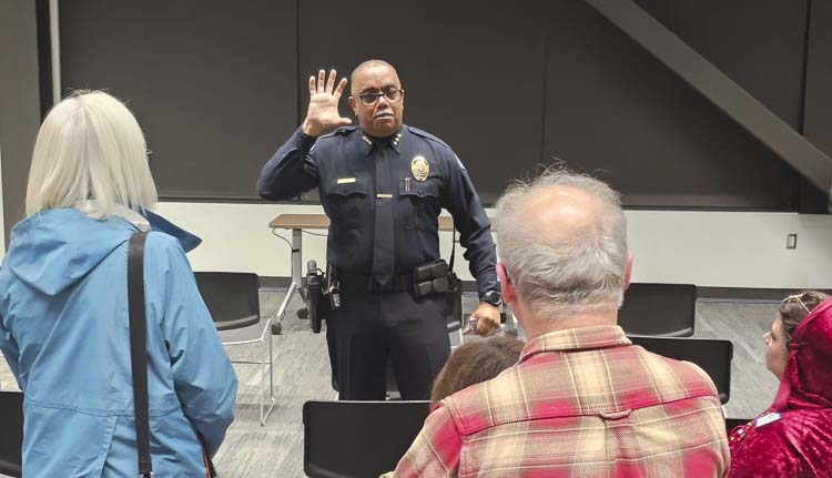 Interim Chief of Police Troy Price took questions for about an hour at a forum on Wednesday, then stayed for another 30 minutes to talk with those who wanted to learn more about him and his vision for the Vancouver Police Department. Price is the lone candidate for the job. Photo by Paul Valencia