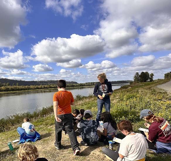 CRGE teacher Marie Klemmer with students at Steigerwald Lake National Wildlife Refuge. Photo courtesy Washougal School District