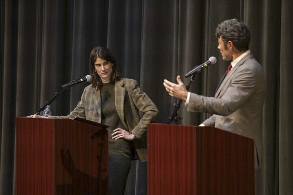 Incumbent Marie Gluesenkamp Perez, left, reacts to a statement from challenger Joe Kent during a Washington 3rd District Congressional debate at Lower Columbia College in Longview on Wednesday (Oct. 2). Photo courtesy Kody Christen/kody@chronline.com