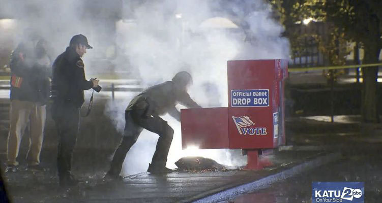 The investigation is continuing following the discovery of an incendiary device inside a ballot box in east Vancouver Monday. Screenshot from video courtesy Evan Bell/KATU via X