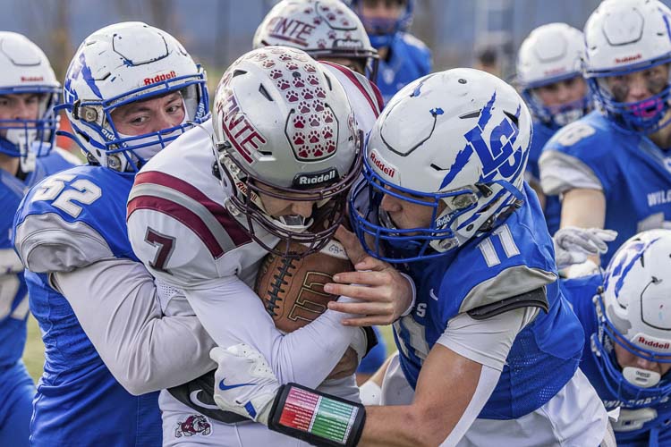 La Center senior Tyson Grove (52) brought a work ethic and toughness to La Center when he moved to the community prior to his junior year. He said he is grateful for his teammates and classmates for welcoming him during a difficult time in his life. Photo by Mike Schultz