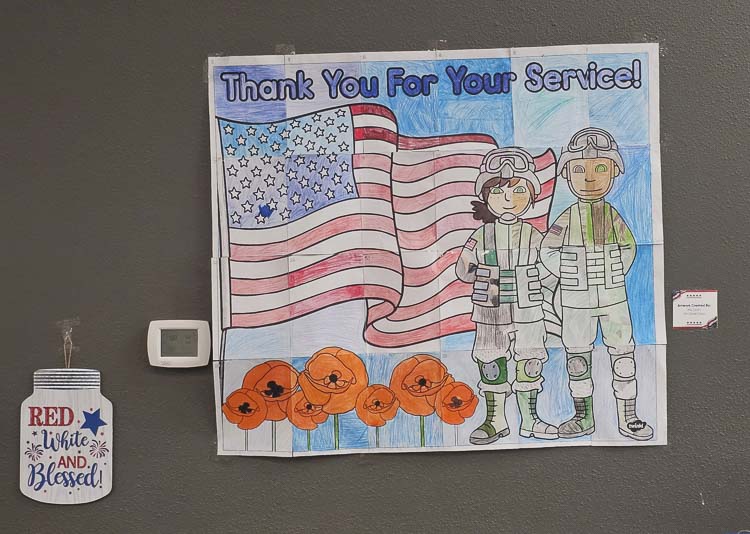 Students created artwork to welcome veterans at King’s Way Christian Schools. Photo by Paul Valencia