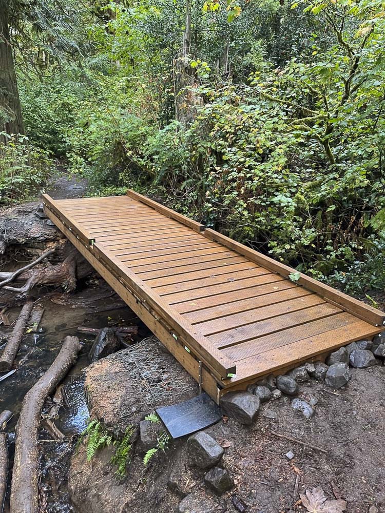 This photo shows the old bridge on the trail to the lower falls in Lacamas Regional Park. Photo courtesy Clark Co. WA Communications