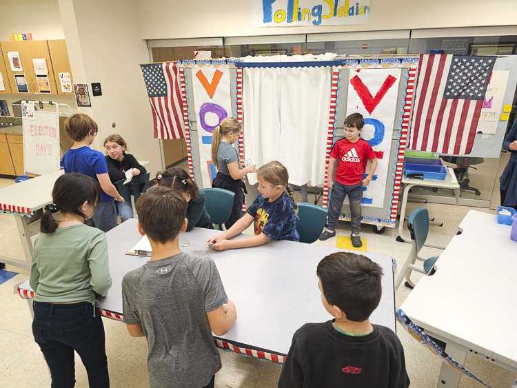 There was a line last week on Election Day at Salmon Creek Elementary School, as third-grade students went to the polls to elect a new mascot for their grade. Photo by Paul Valencia