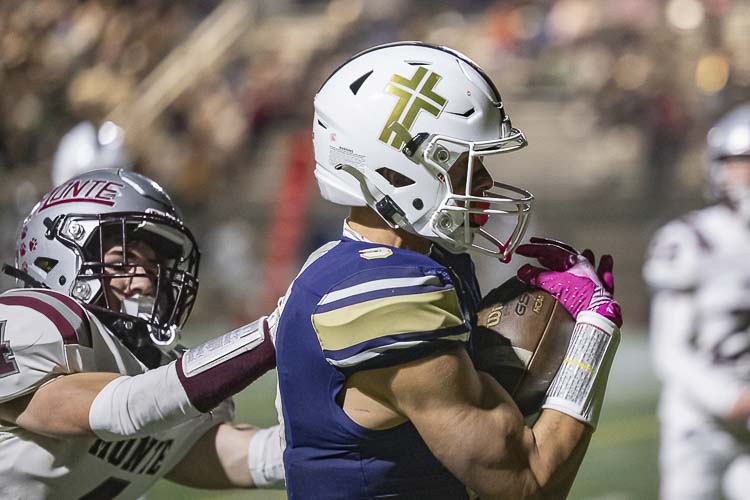 Seton Catholic’s Ryker Ruelas shows off his muscles and his hands, hauling in a 44-yard touchdown pass from Kolten Gesser in Saturday’s win over Montesano. Photo by Mike Schultz