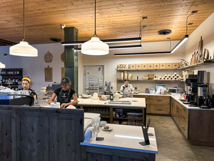 The heart of the bakery in action—watch as the team prepares fresh treats and serves up delicious drinks in their beautifully designed open kitchen. Photo by Andi Schwartz