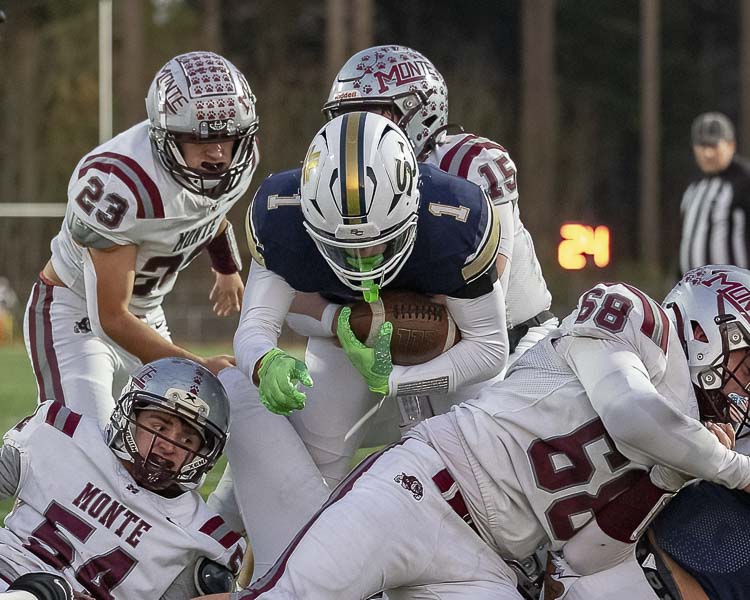 Joe Callerame finds space to score the first touchdown of the game Saturday, helping Seton Catholic defeat Montesano 35-14 at McKenzie Stadium. Photo by Mike Schultz