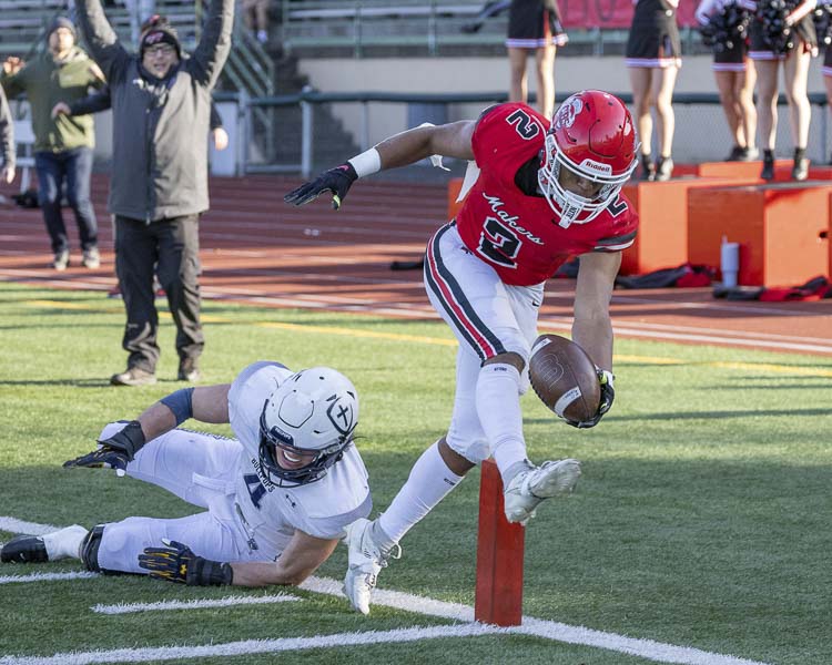 Titan Brody got into the end zone with 4 seconds left in the first half to give Camas some momentum. The Papermakers would rally in the second half to beat Gonzaga Prep in the Class 4A state semifinals. Photo by Mike Schultz