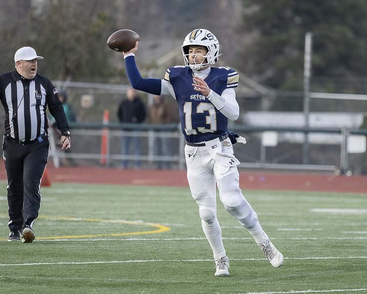 Kolten Gesser of Seton Catholic said he just gets the ball to his playmakers. Well, Seton has a lot of those. The Cougars have advanced to the Class 1A state championship football game. Photo by Mike Schultz