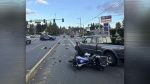 A motorcycle rider suffered life-threatening injuries in a collision with a pickup truck in Vancouver.