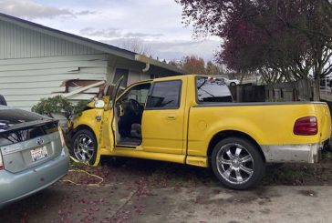 Driver arrested after crashing truck into Vancouver home