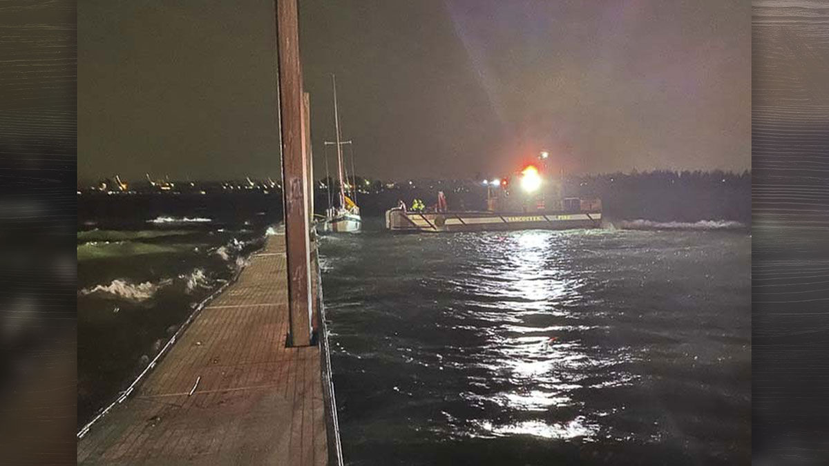 Vancouver Fire Department rescued a man and his dog stranded on the Columbia River during Tuesday night’s storm.