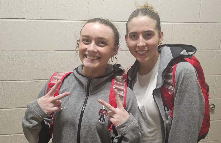 Keirra Thompson, left, and Sophie Buzzard are the senior leaders for a young Camas girls basketball team. The defending state champions are once again challenging themselves with a tough non-league schedule. Photo by Paul Valencia