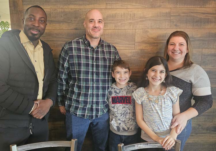 The Tix for Tots organization includes, from left to right, Cemal Richards, secretary; Jeff Anaya, treasurer; Mateo Anaya, “security”; Adele Anaya, president; and Leah Anaya, vice president. Tix for Tots raises funds to buy tickets to the arts for children and their families in need. Photo by Paul Valencia