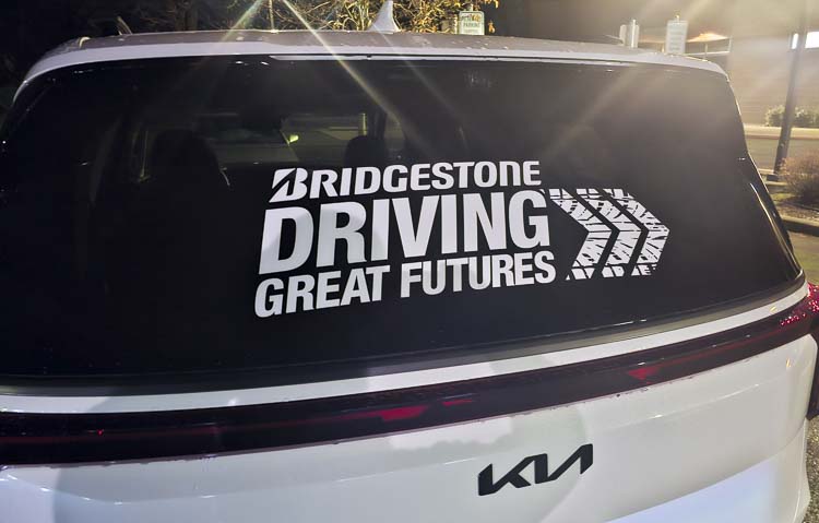 The new Kia van, given to the Boys and Girls Clubs of Southwest Washington, is part of Bridgestone’s initiative called Driving Great Futures. Southwest Washington was one of 10 organizations nationwide to receive the grant for a new van. Photo by Paul Valencia