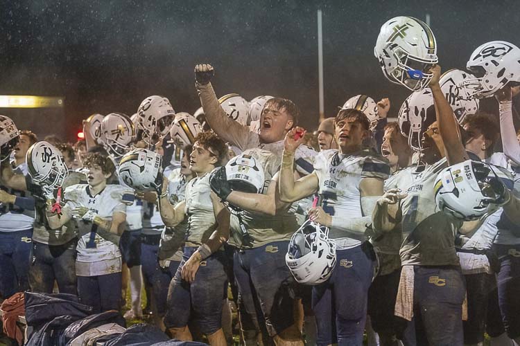 While Seton Catholic lost Friday in the championship game, it was still an epic season for the Cougars. They won the Trico League title (celebrating the league title in this photo) and reached the state finals at Husky Stadium in Seattle. Photo by Mike Schultz