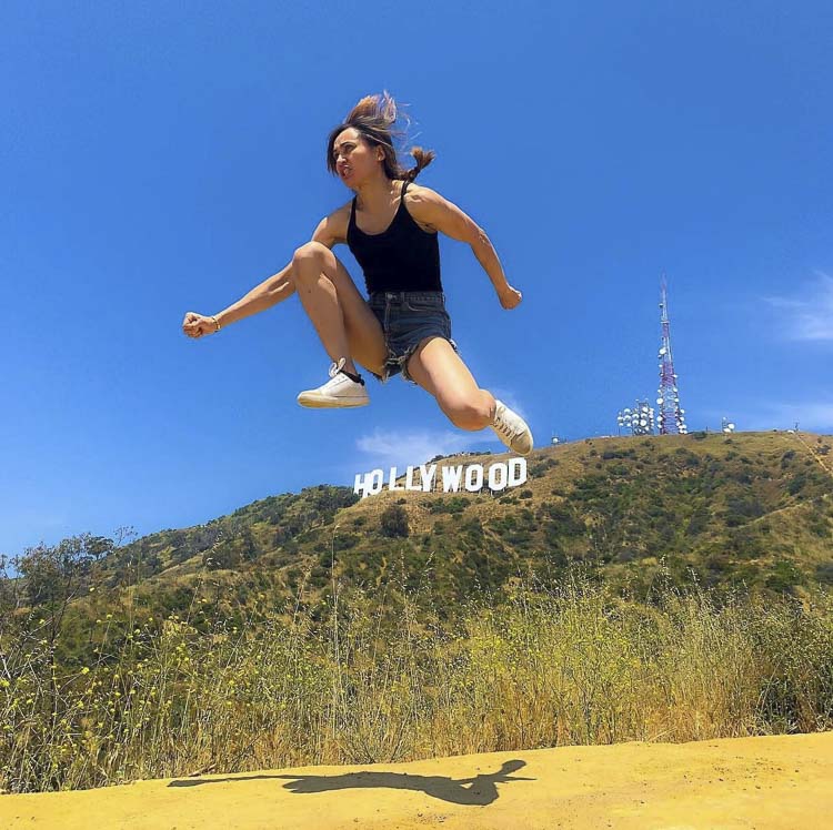 Aja Frary “jumps over the Hollywood sign” in this fun photo. Frary, a 1996 graduate of Evergreen High School in Vancouver, has been a stunt woman for nearly 20 years. Photo courtesy Aja Frary