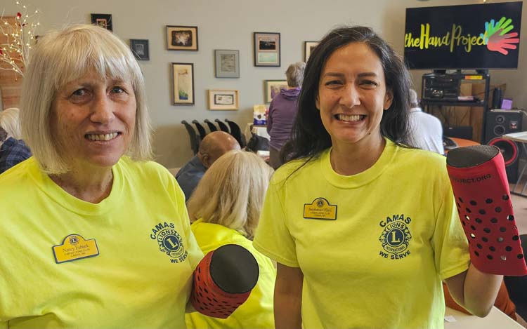 Nancy Eubank and Stephanie O’Dell of the Camas Lions Club and the rest of the club’s members assembled prosthetic hands for The Hand Project on Saturday. They also did so with just one hand, to feel what it is like to only have one hand. Photo by Paul Valencia