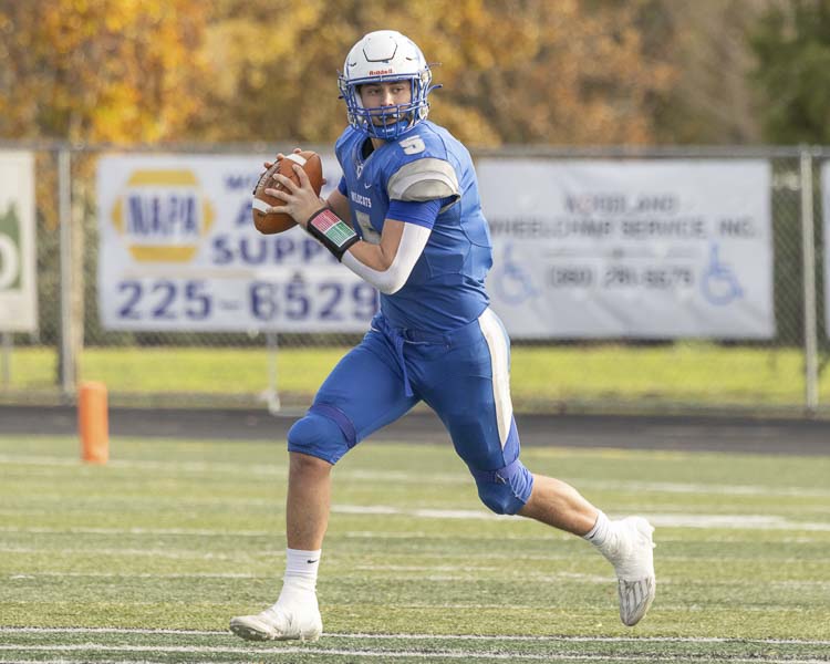 Wyatt Eiesland of La Center, shown here on offense, was voted all-state on defense for the Wildcats. Photo by Mike Schultz