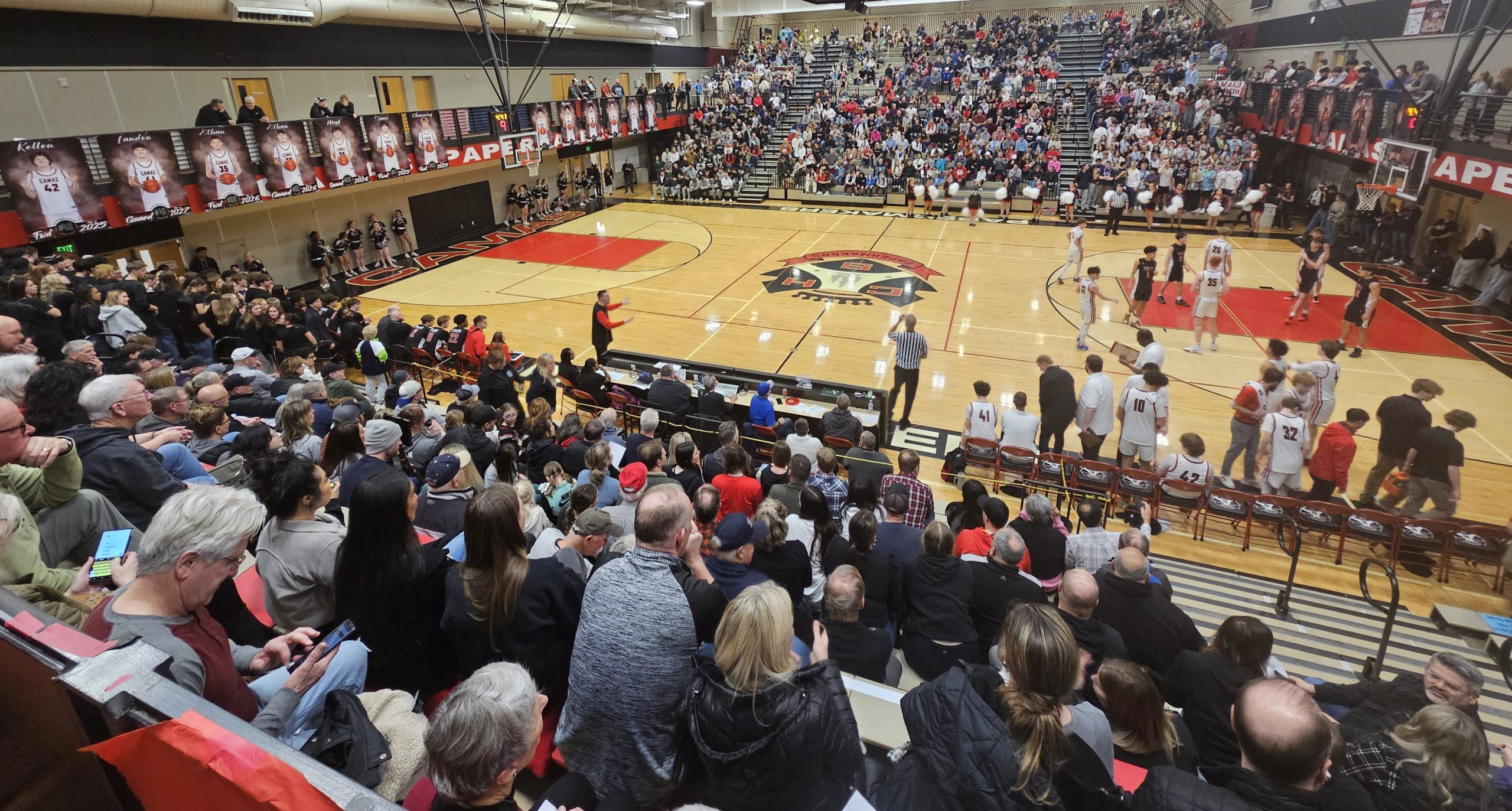 It was hard to find a place to sit for the boys game Friday night between Camas and Union, and for the girls game, there were more fans who opted to stand on the balcony above the court. Photo by Paul Valencia