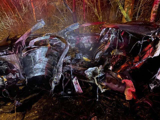 A bystander rescued a driver from a burning vehicle after a crash on I-205 near Padden Parkway before emergency crews arrived.